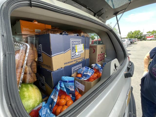 Suburban loaded to the max with food.