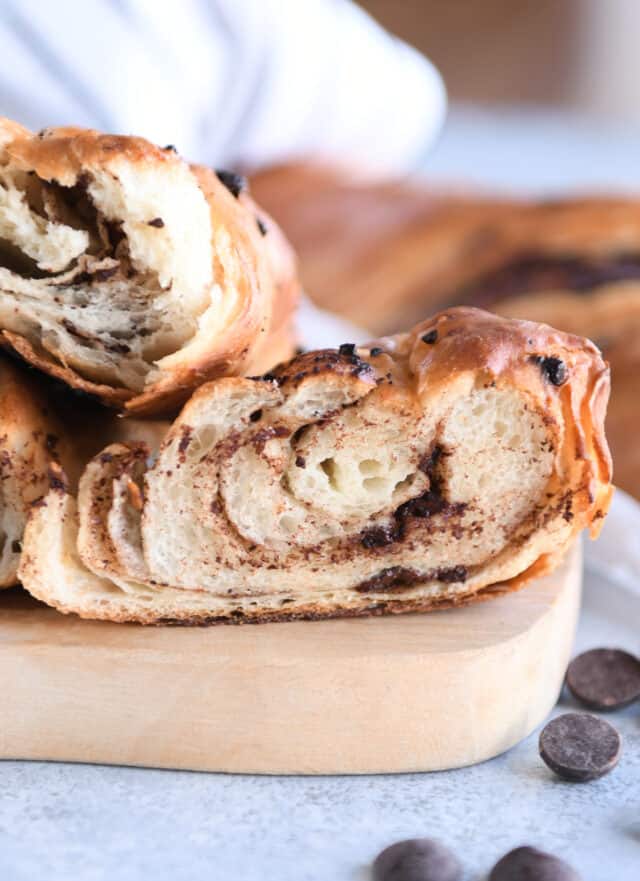 Half of baked loaf of croissant French bread.