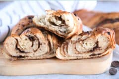 Three halves of chocolate croissant French bread.