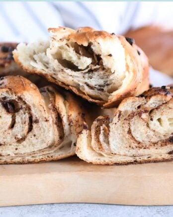 Three halves of chocolate croissant French bread.