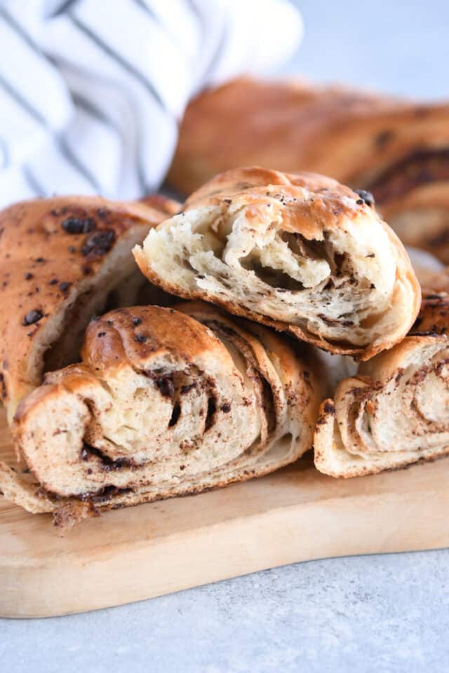 Three halves of chocolate croissant French bread.