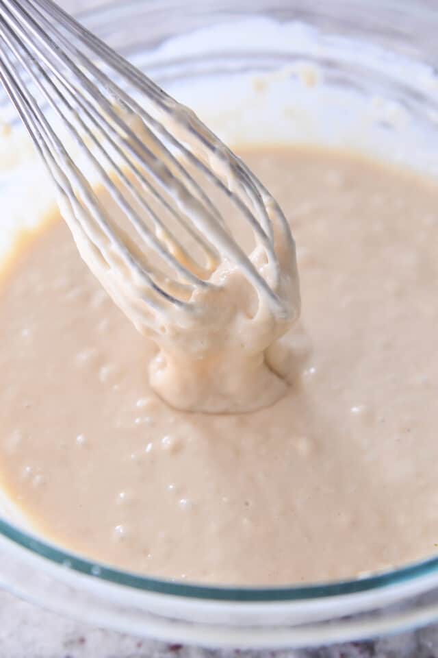 Whisk drizzling waffle batter back into glass bowl.