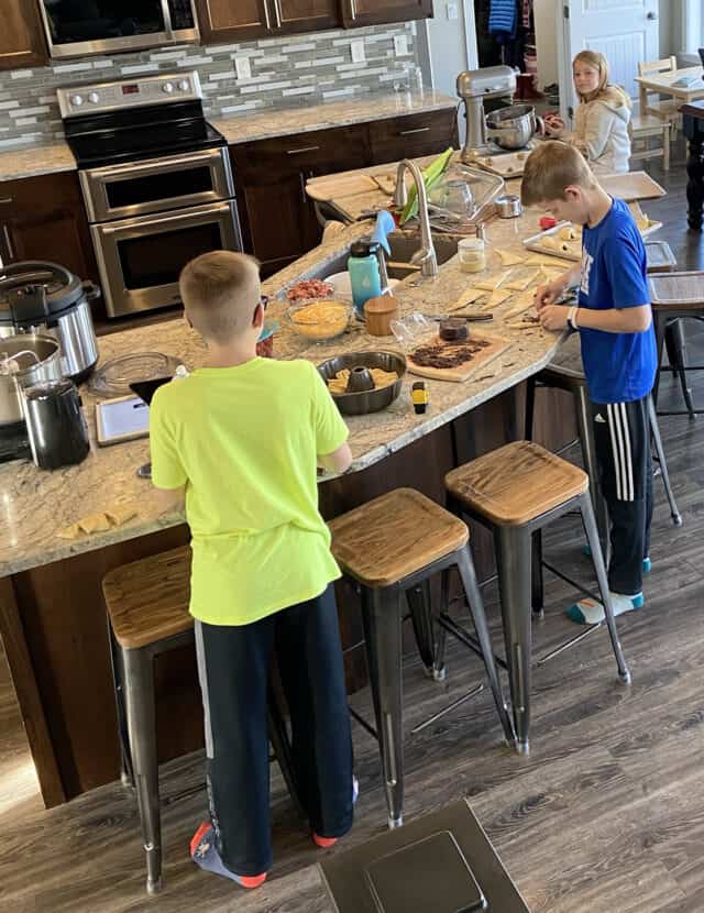 Kids cooking in the kitchen. 
