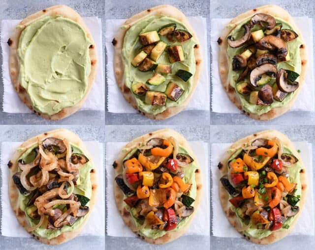 Assembling flat bread with avocado sauce, roasted zucchini, mushrooms, caramelized onions, roasted peppers and green onions.