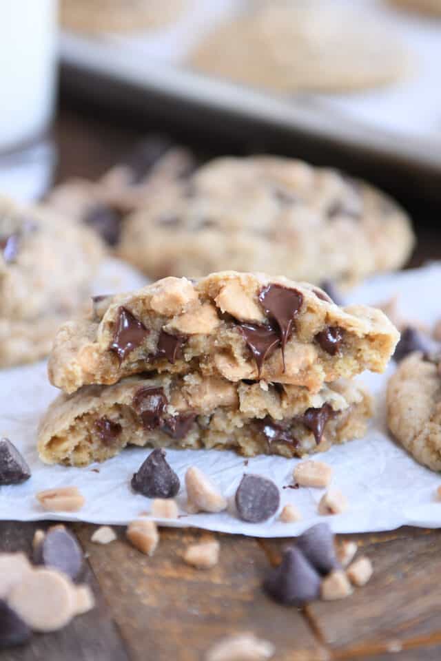 Cookie broken in half and stacked with melty chocolate chips.