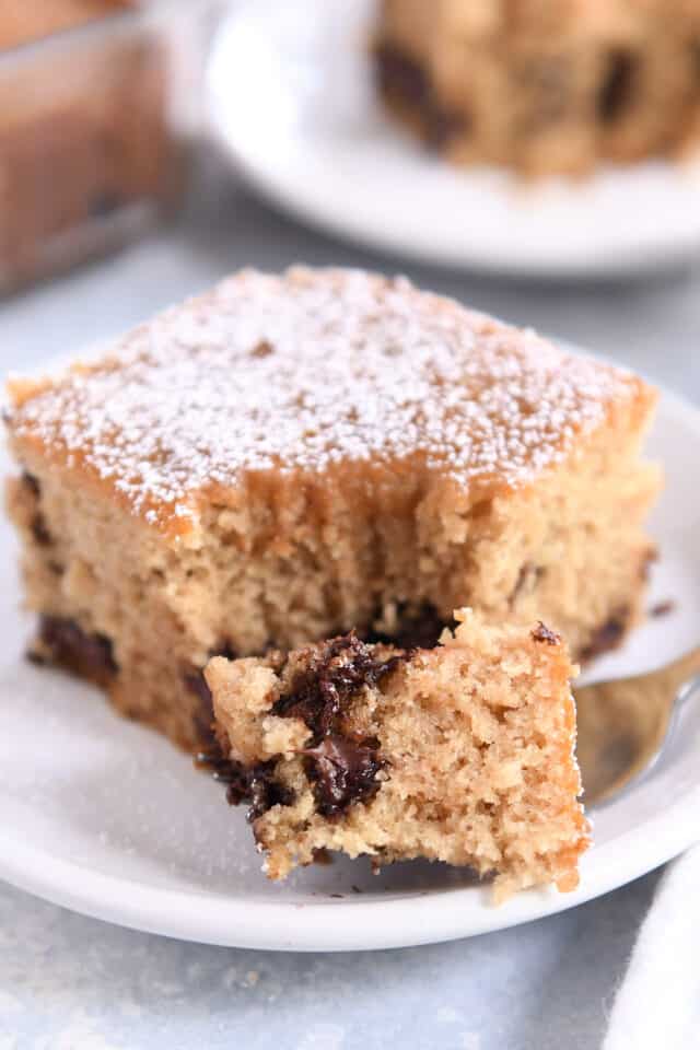 Bite of chocolate chip cake on fork.