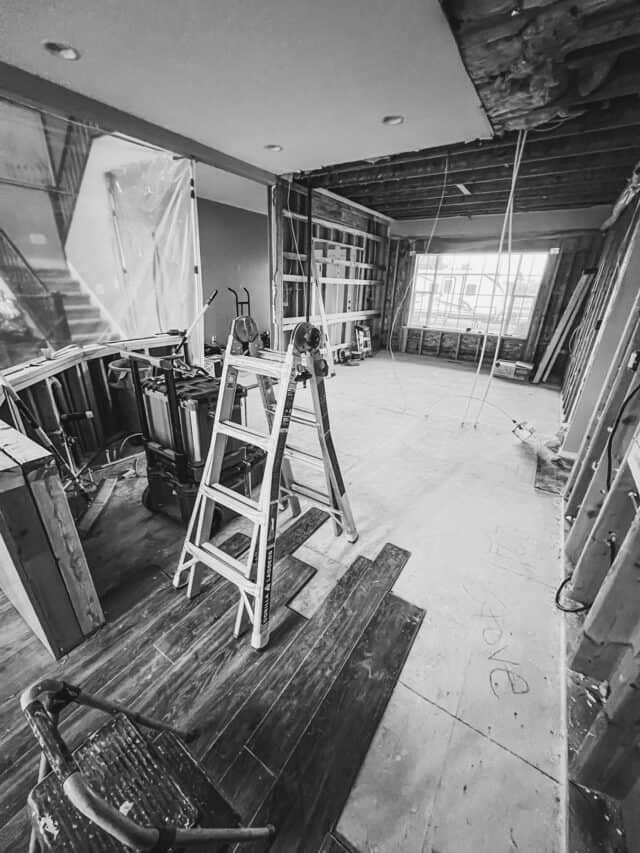 Demolished kitchen in black and white.