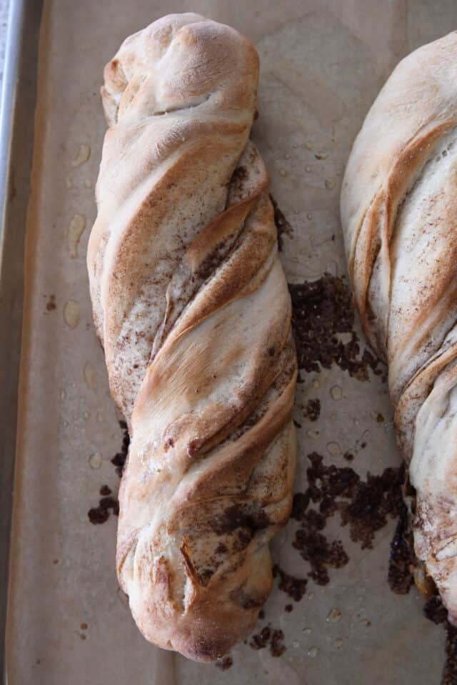 Baked loaf of cinnamon sugar twisted croissant bread.