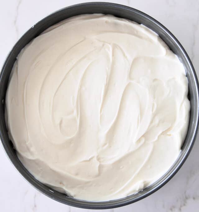 Cheesecake batter in springform pan.