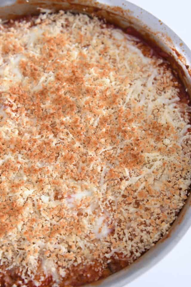 Browned panko bread crumbs on top of Italian skillet meal.