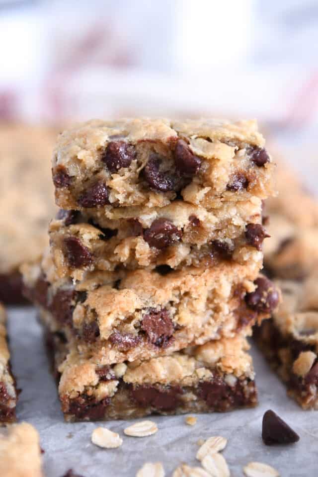 Several stacked oatmeal chocolate chip cookie bars.