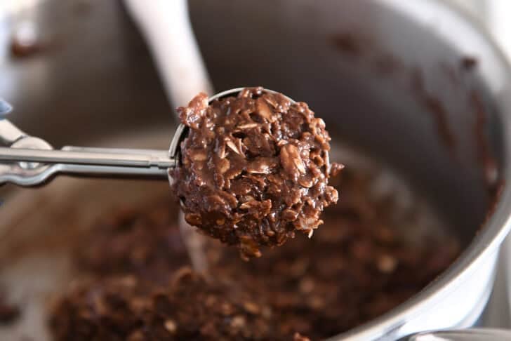 Cookie scoop scooping no-bake cookie batter.