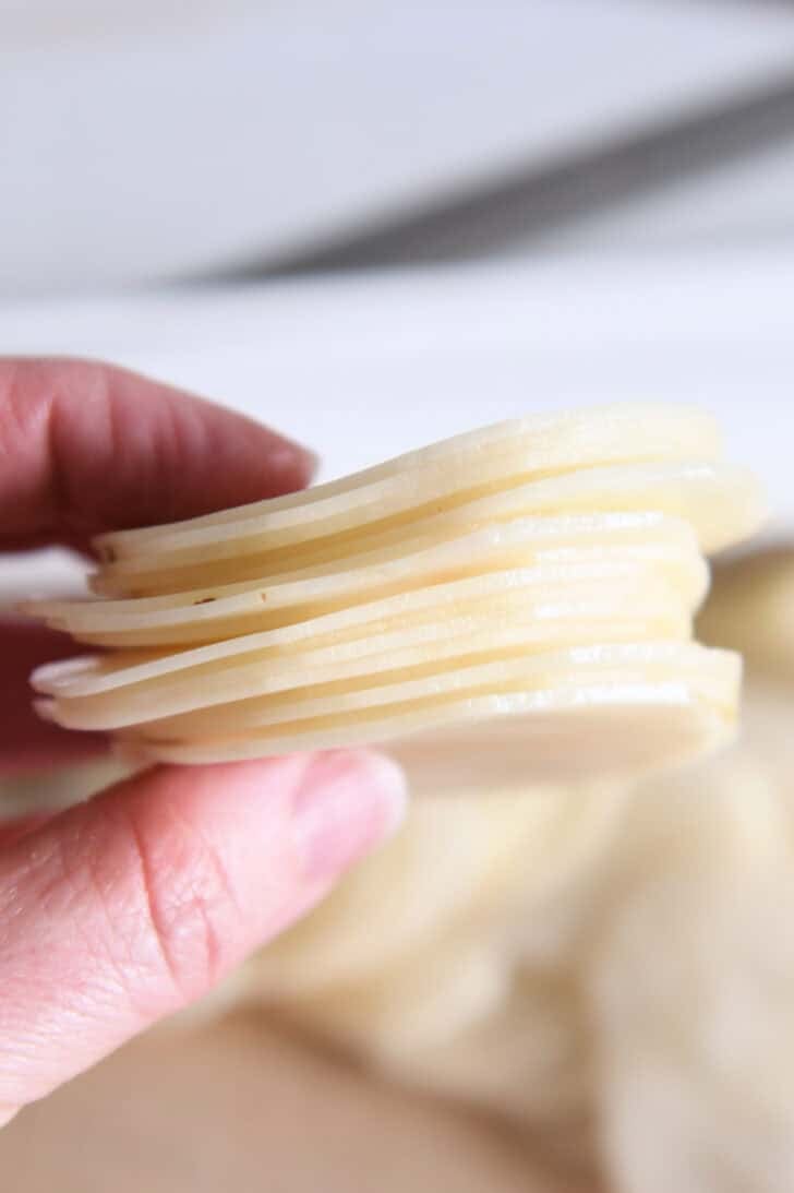 Thin slices of russet potatoes.