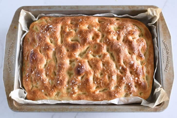 Top down view of focaccia bread baked in a 9X13 inch pan.