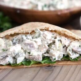 Whole wheat pita bread stuffed with lettuce and dill pickle chicken salad.