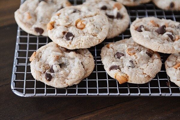 Chocolate and butterscotch chip cookies on a cooling rack. 