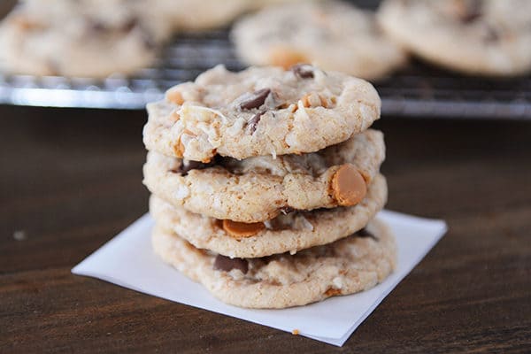 A stack of four chocolate and butterscotch chip cookies. 