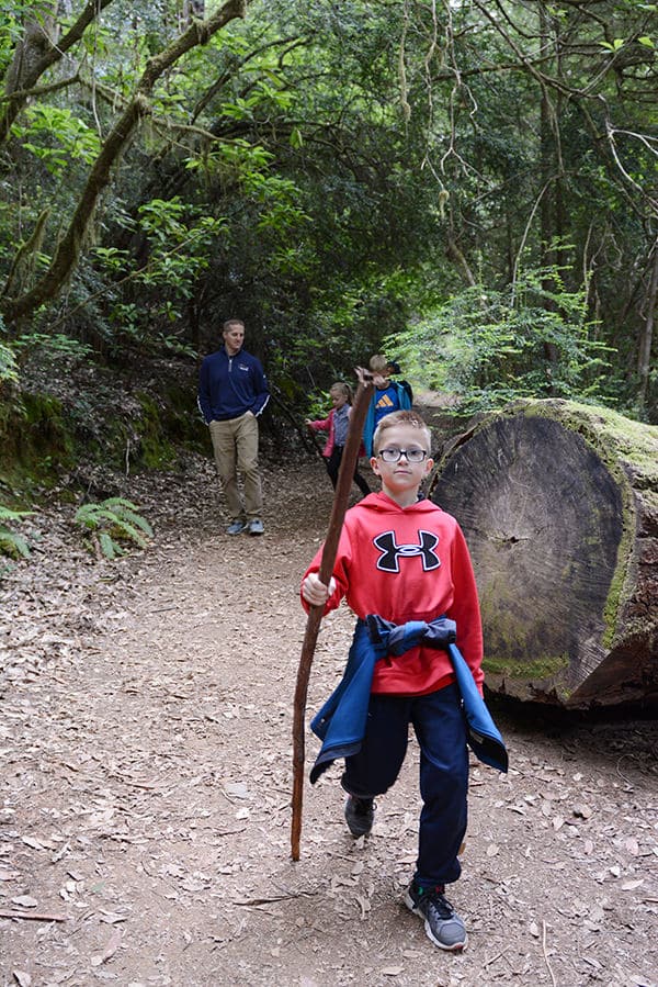 A family hiking on a flat trail.