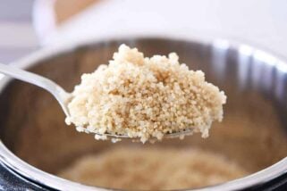 Spoonful of cooked quinoa in the Instant Pot.