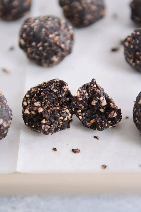 Healthy Dark Chocolate Almond Joy Bites with the front bite split in half. 