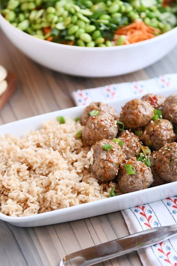 Platter of Asian meatballs and brown rice.
