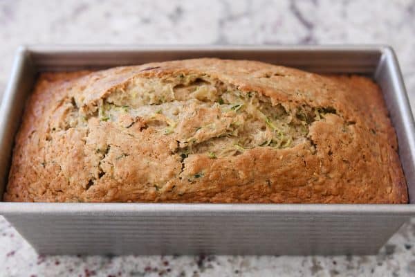Baked loaf of zucchini banana bread.