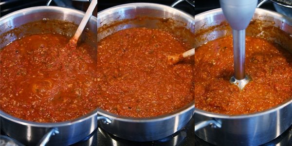 Simmering sauce in large pot for homemade canned spaghetti sauce recipe.