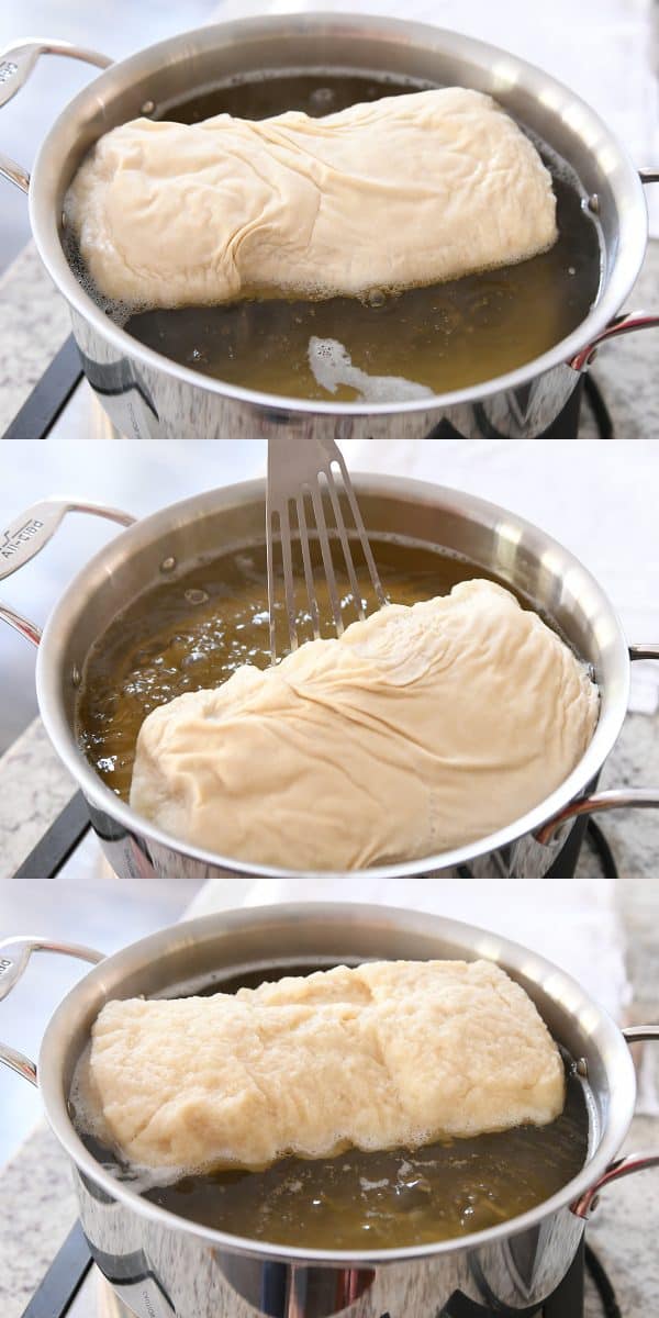 A loaf of bagel bread boiling in a pot of water.