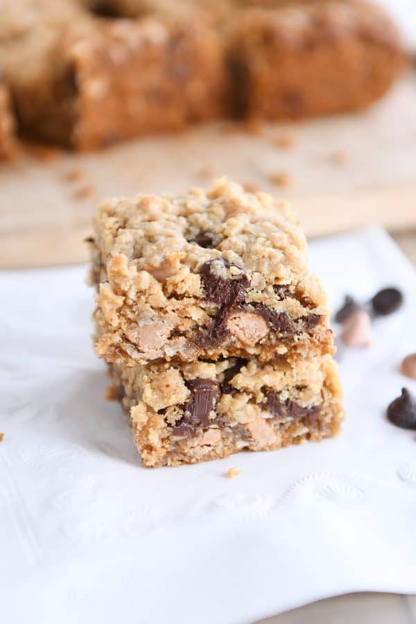 Two butterscotch PB monster cookie bars stacked on each other.