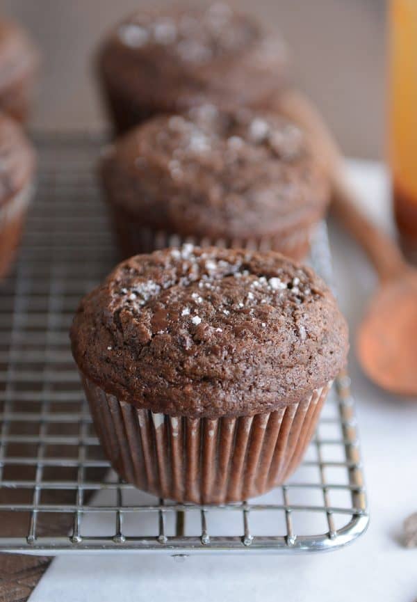 Double chocolate salted caramel muffin on cooling rack