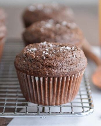 Double chocolate salted caramel muffin on cooling rack