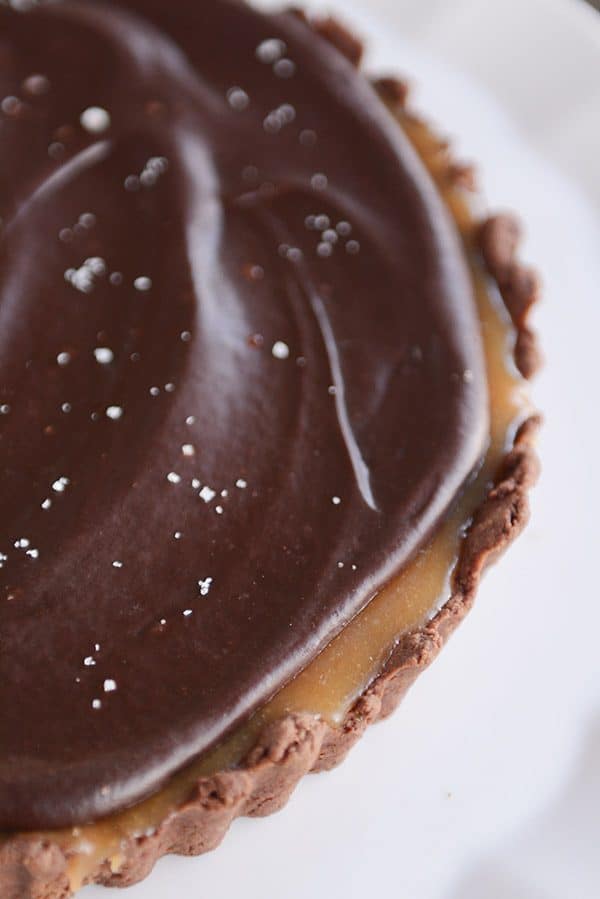 Top view of a chocolate caramel tart.