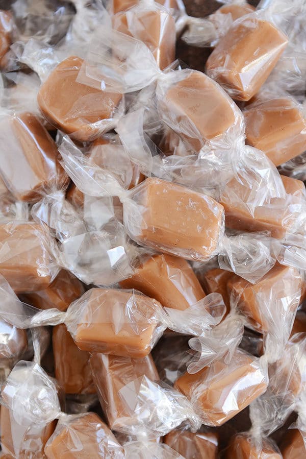 A bunch of wrapped vanilla caramels. 