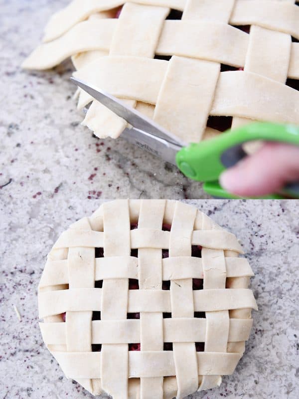 Trimming edges of cherry pie crust with kitchen scissors.