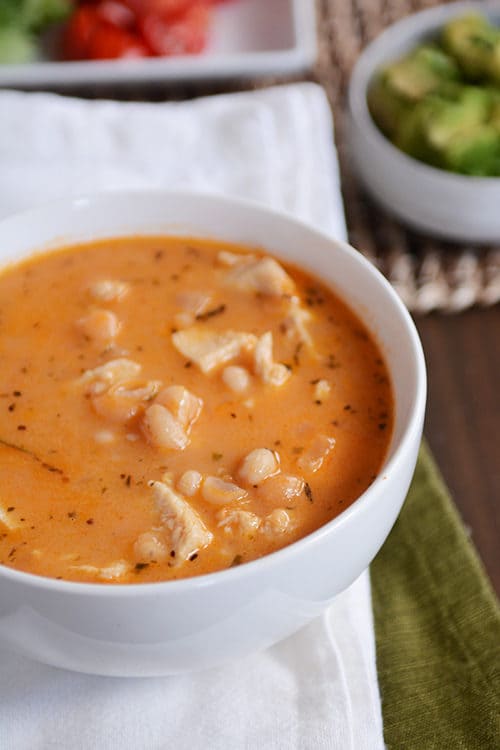 A bowl full of white bean chicken chili.