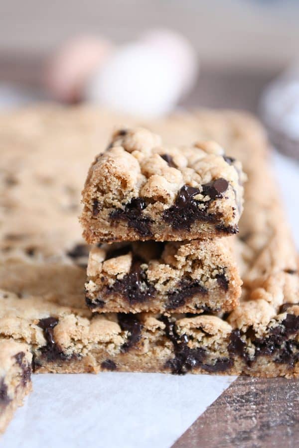 Two chocolate chip cookie bars stacked.