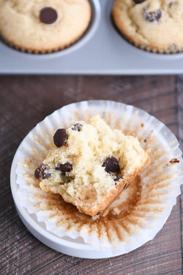 Chocolate chip muffin split in half.