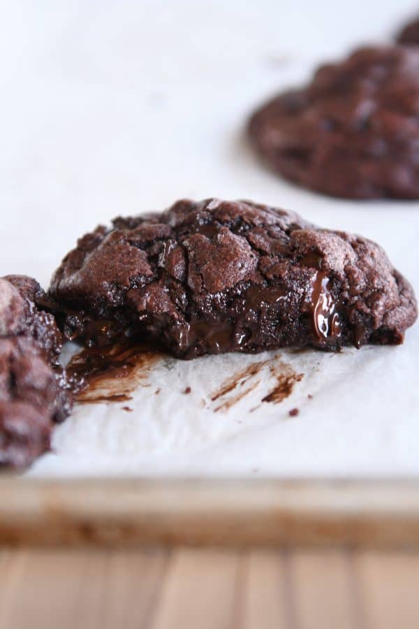 Double dark chocolate cookie split apart - super gooey inside.