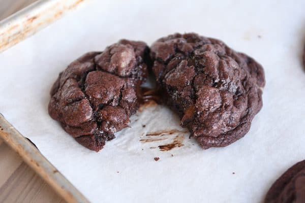 Double dark chocolate cookie split apart - super gooey inside.