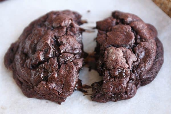 Double dark chocolate cookie split apart - super gooey inside.