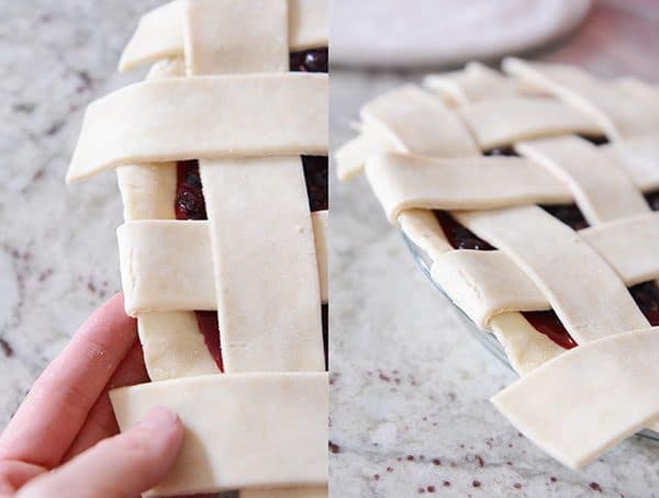 Side view of an uncooked lattice pie crust.