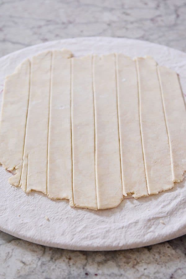 Unbaked pie crust cut into strips.