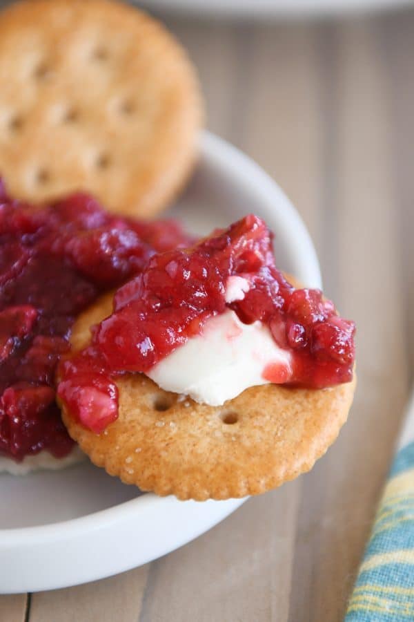 Cranberry pecan cream cheese dip on ritz cracker.