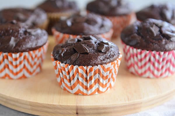 Chocolate chunk muffins in colorful liners.