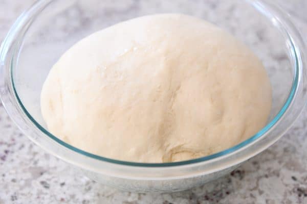 Dough rising for small batch cinnamon rolls recipe.