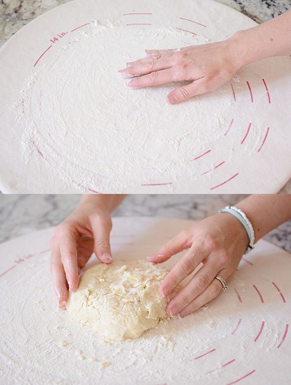 A hand rubbing flour on a pie pastry cloth with a picture of pie crust dough on the pastry cloth below it.