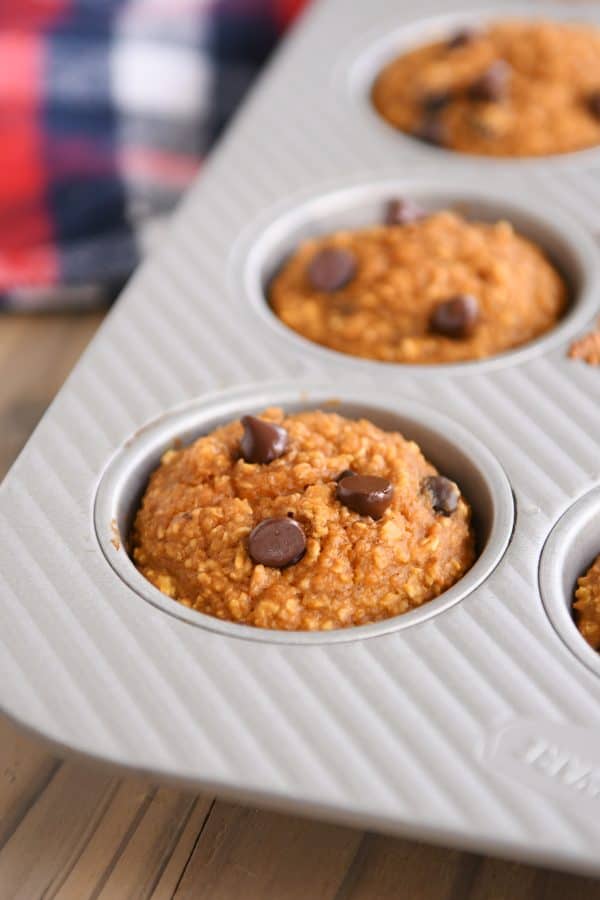 Easy pumpkin blender muffins baked in muffin tin.