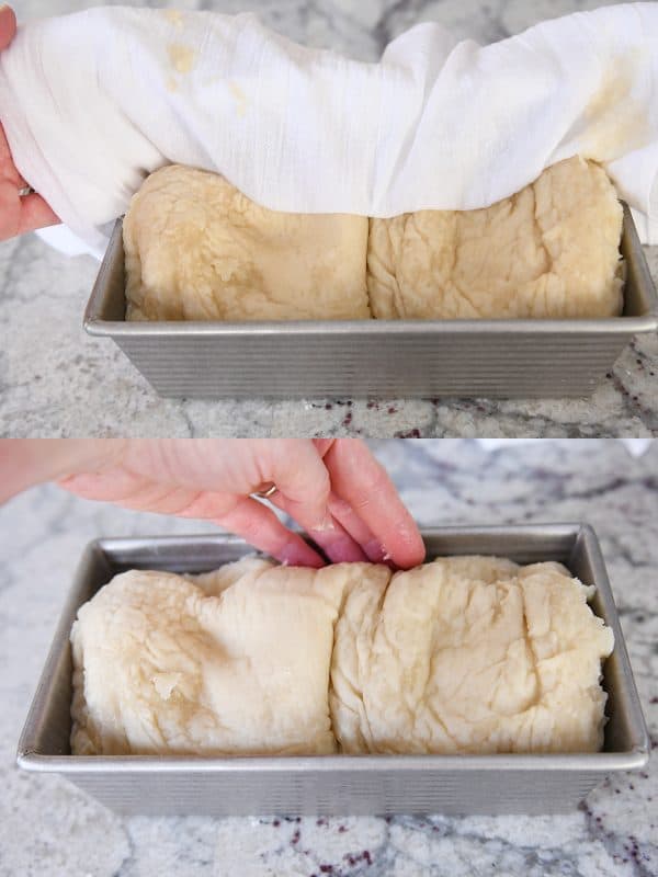 an uncooked loaf of bagel bread getting put into a metal loaf pan