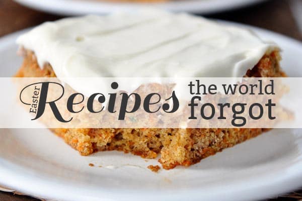 A piece of carrot cake with a bite taken out with the text recipes the world forgot over the top.