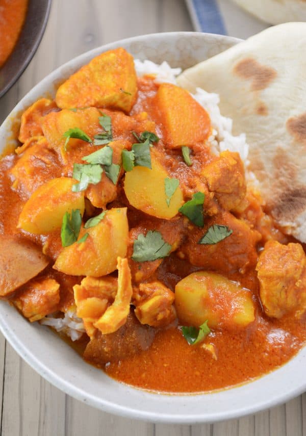 Instant pot Indian butter chicken and potato curry over white rice.